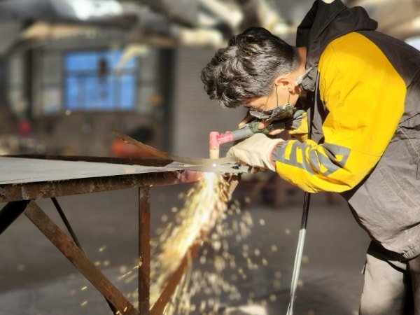 Cutting the material for sculpture