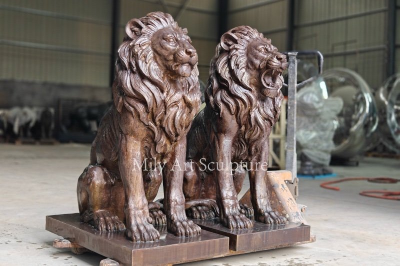 pair of bronze lion statues