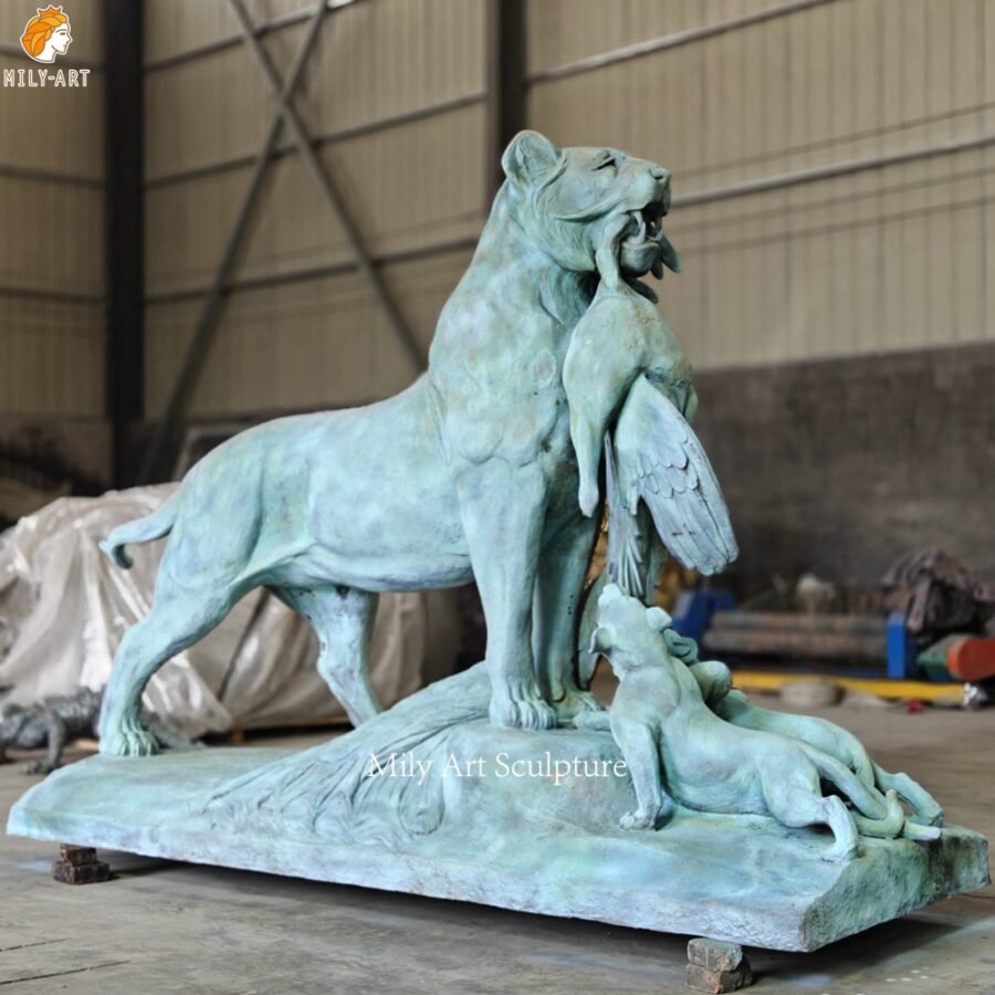 Life Size Bronze Mother Lion Eating Crane Feeding Little Lions Statue Side Photo