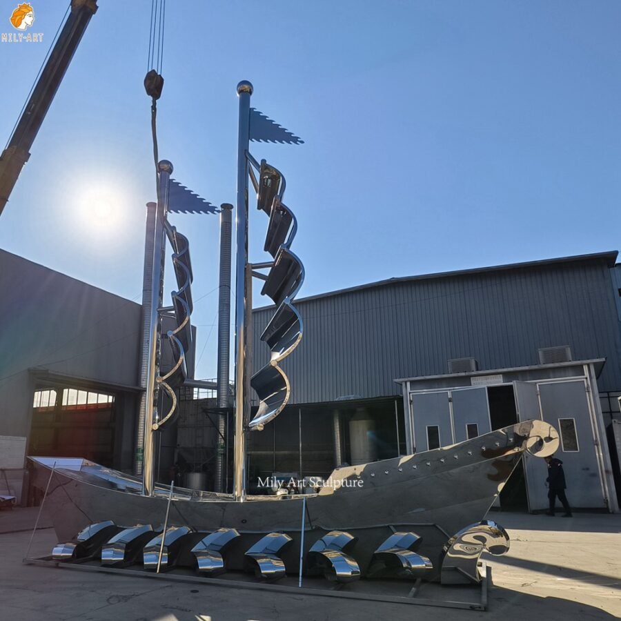 Polished Stainless Steel Sailing Boat Sculpture Front View